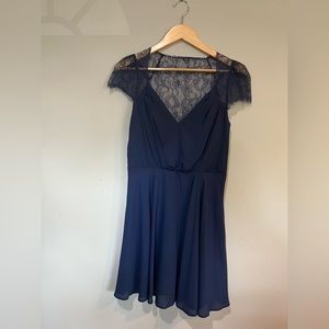Lace detail Navy Party dress. Fun and Flirty cocktail dress. Size 8. Flattering.